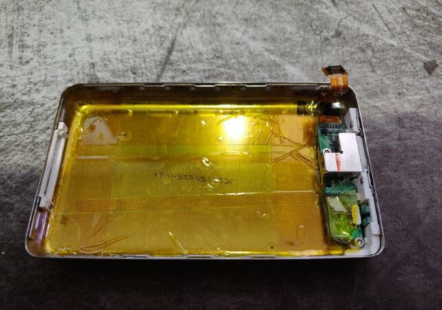 Insulating the iPod classic shell for the SpotiPod build.